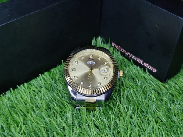 Premium And Elegent Tomi Wrist Watch For Men's Gold Dial